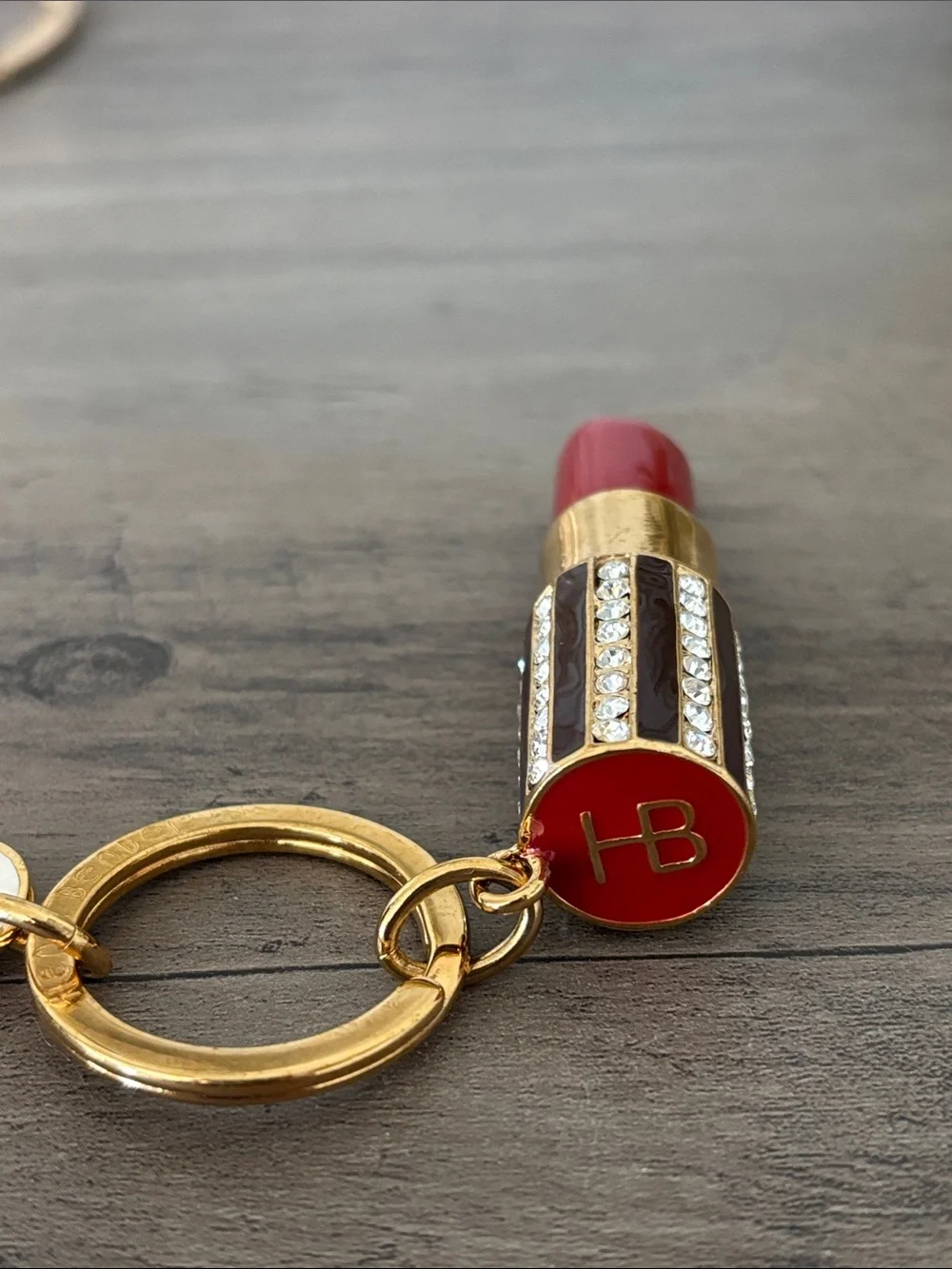 henri bendel Gold Lipstick Keychain with Red Accent